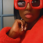 model wearing a red sunglasses