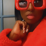 model wearing a red sunglasses