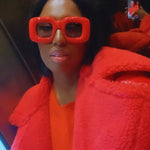 Model wearing red sunnies