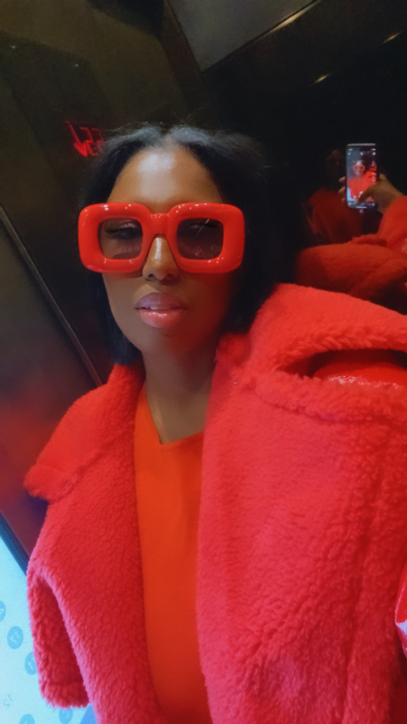 Model wearing red sunnies
