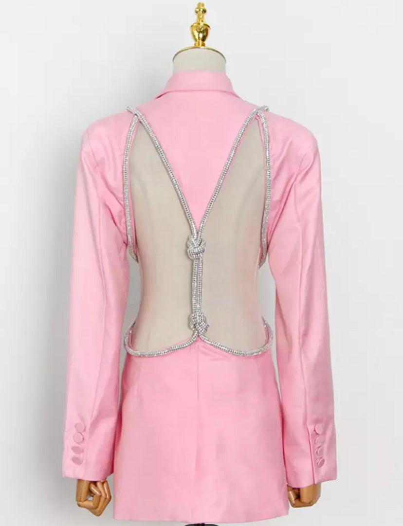 A cut out pink blazer